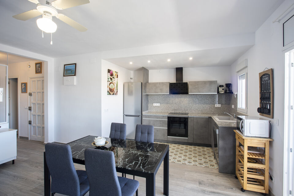 Renovated two-bedroom penthouse with mooring and parking in a quiet area