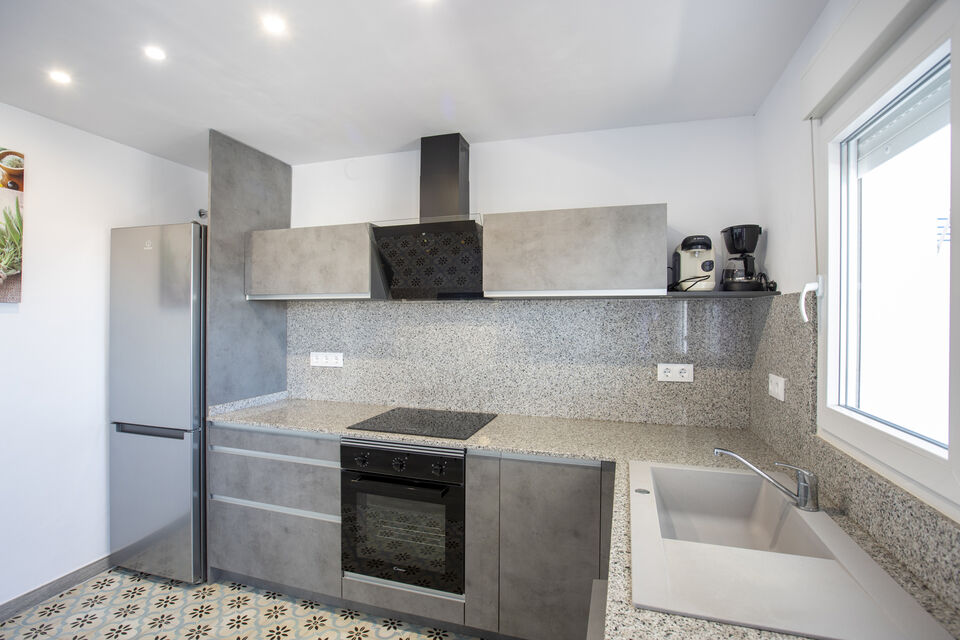 Renovated two-bedroom penthouse with mooring and parking in a quiet area